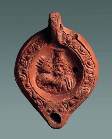 Diskuslampe: Helios küßt Serapis; Stempelmarke "EPHESNI"