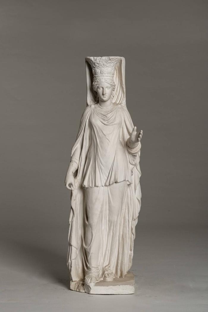 Moderne Miniaturfassung einer weiblichen Stützstatue (Karyatide)
