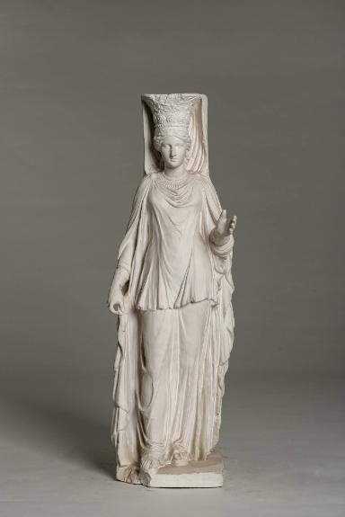 Moderne Miniaturfassung einer weiblichen Stützstatue (Karyatide)