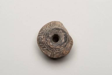 Verzierter Spinnwirtel