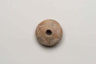 Verzierter Spinnwirtel
