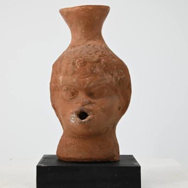 Flasche: Männlicher Kopf