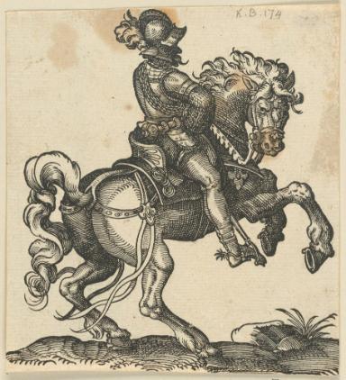 Ein Reiter in Rüstung auf einem steigenden Pferd